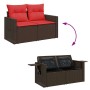 Braune 6-tlg. Garten-Sofagarnitur aus Rattan mit roten Kissen und Stauraum.