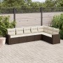 Braune 7-tlg. vidaXL Garten-Sofagarnitur aus Poly Rattan mit cremefarbenen Kissen.