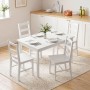 Weiße HOMCOM Essgruppe aus Kiefernholz mit rechteckigem Tisch und vier Stühlen in moderner Küche. 5-teiliges Set, platzsparend.