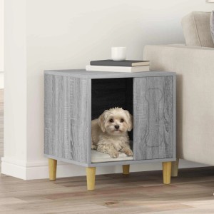 Moderne Hundehütte Graues Sonoma aus Holzwerkstoff mit Knochenmotiv. Kleiner Hund liegt auf Kissen. Ideal für drinnen.
