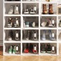 HOMCOM Schuhschrank, transparent, mit verschiedenen Schuhen gefüllt.