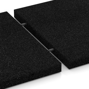 Anthrazitfarbene WARCO Fallschutzplatten (50x50x4,5 cm) mit Steckverbindern für Gartenhäuser.