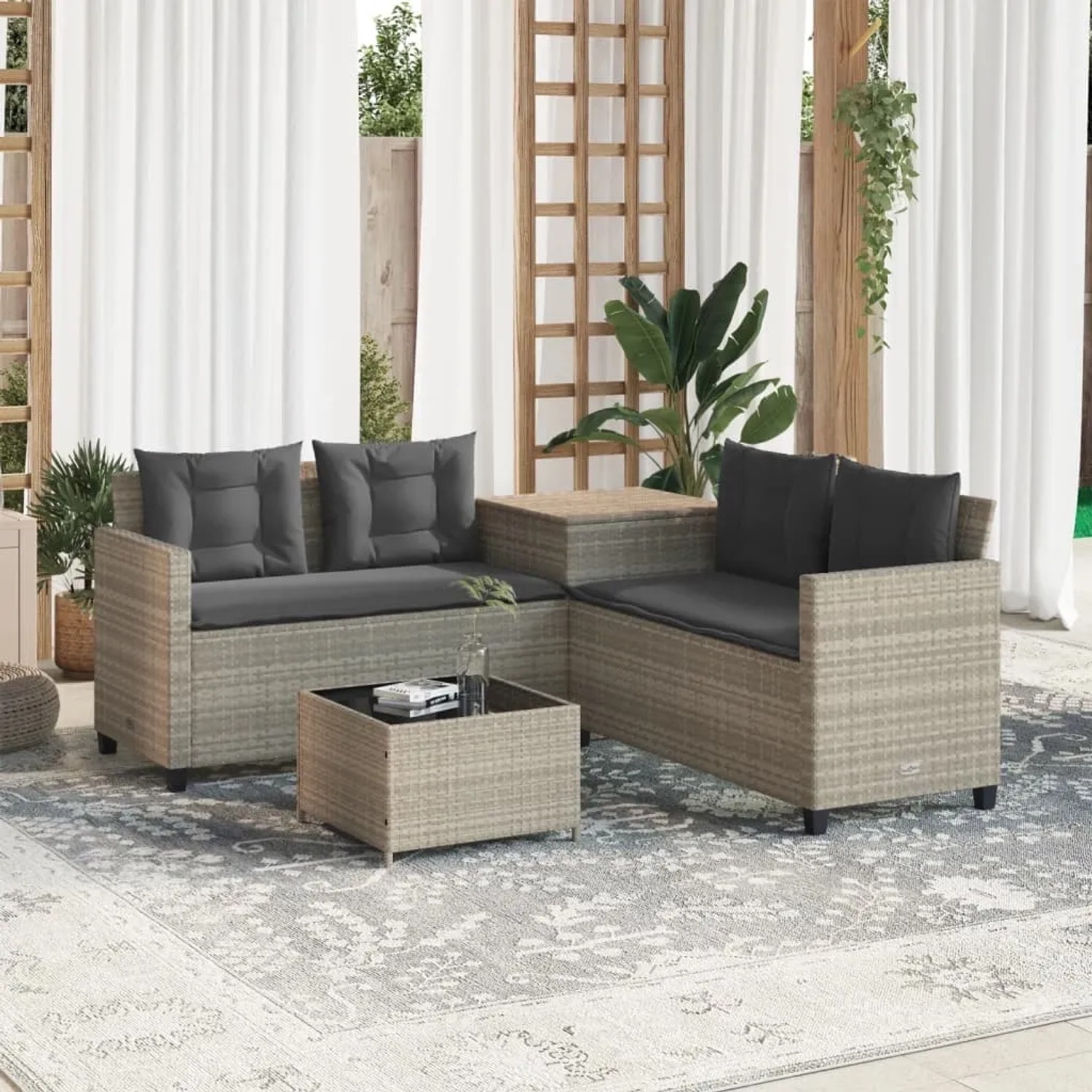 Hellgraues vidaXL Gartensofa in L-Form mit Tisch und Kissen aus Poly Rattan.