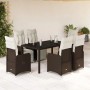 7-tlg. Garten-Bistro-Set aus braunem Poly Rattan mit Tisch, Stühlen und cremeweißen Kissen.