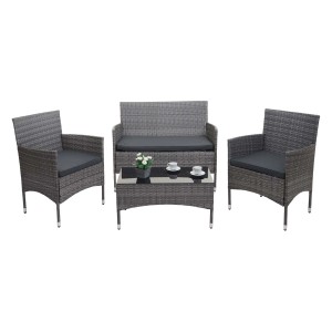 4-teilige, graue Poly-Rattan Lounge-Garnitur mit dunklen Kissen und Tisch mit Glasplatte.