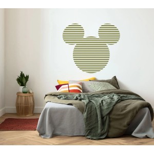 Selbstklebende, runde Mickey Mouse Tapete in Grün/Weiß (Ø 125cm) über einem Bett.