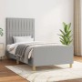 Hellgraues Stoff-Bettgestell 90x200 cm mit Kopfteil für erholsamen Schlaf im Schlafzimmer.