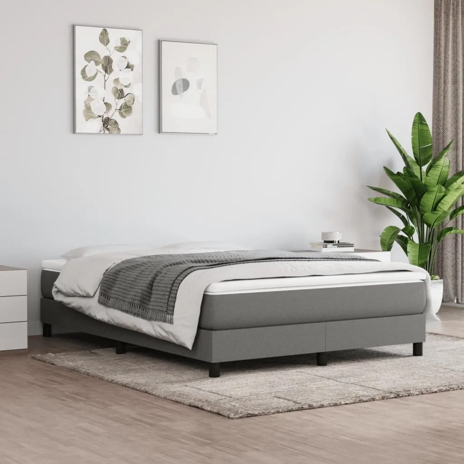 Dunkelgraues vidaXL Boxspringbett 140x190 cm mit Matratze und Topper.