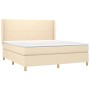 Cremefarbenes vidaXL Boxspringbett 180x200 cm mit Matratze und Kopfteil.