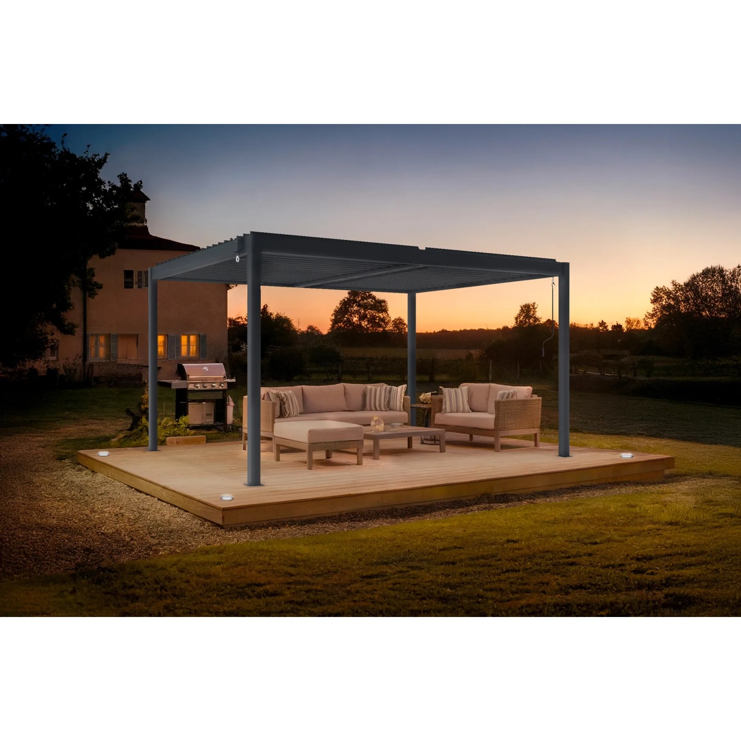 Graue Cazeboo Piana Bioklimatische Pergola 4x3m mit Lounge-Möbeln auf Holzterrasse.