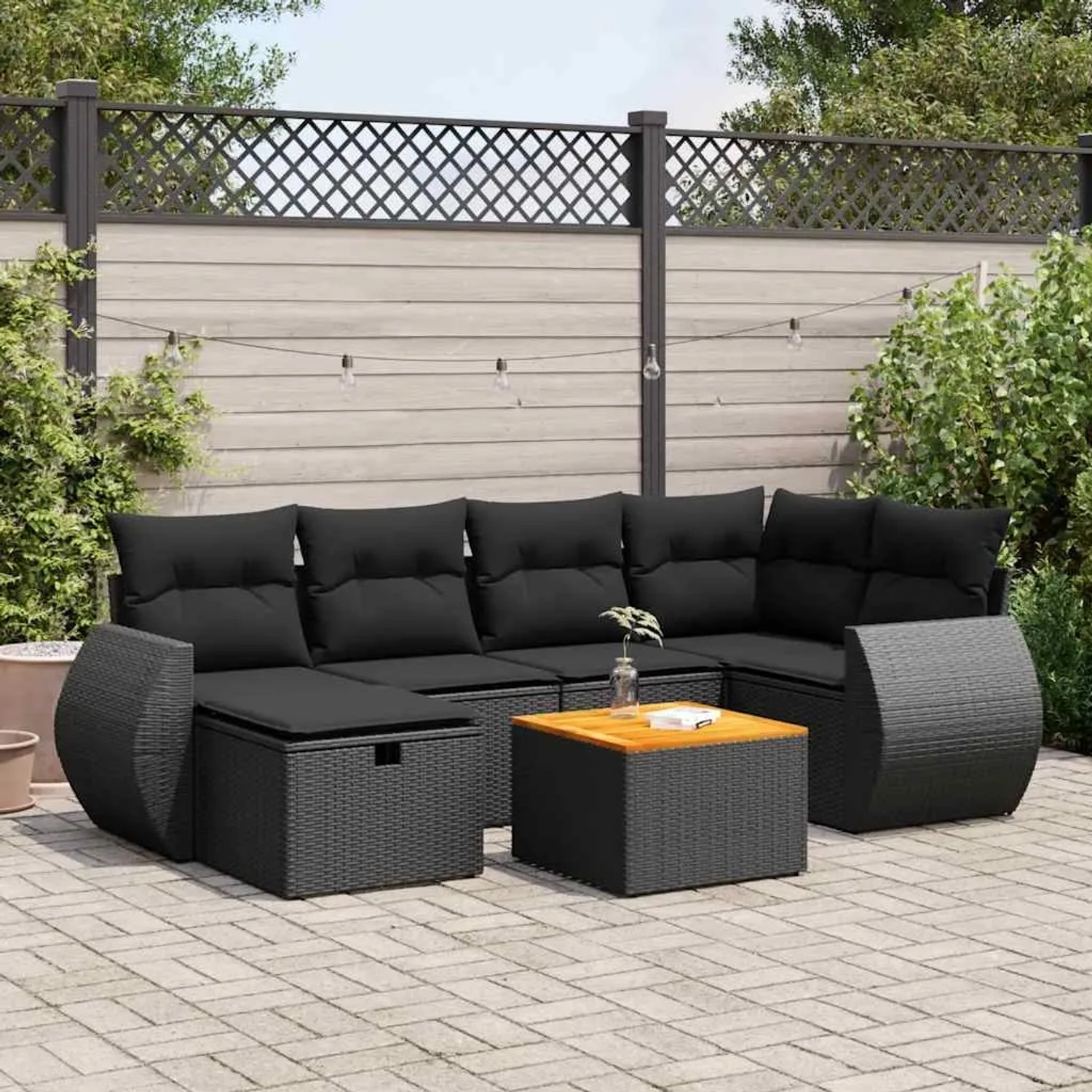 Schwarze 7-tlg. vidaXL Garten-Sofagarnitur aus Poly Rattan mit Kissen und Tisch.