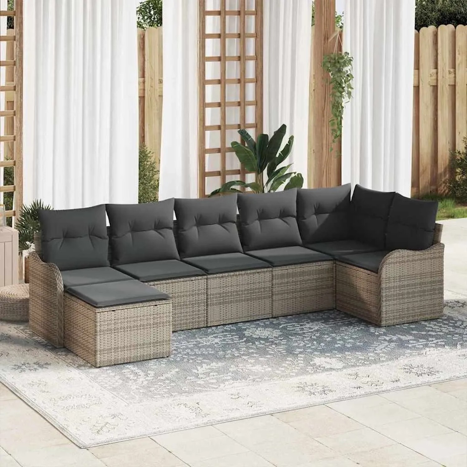 Graues 7-teiliges vidaXL Garten-Sofa-Set aus Poly Rattan mit Kissen für Garten oder Terrasse.