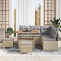 Beiges 8-teiliges Garten-Sofa-Set aus Poly Rattan mit Tisch und Kissen.