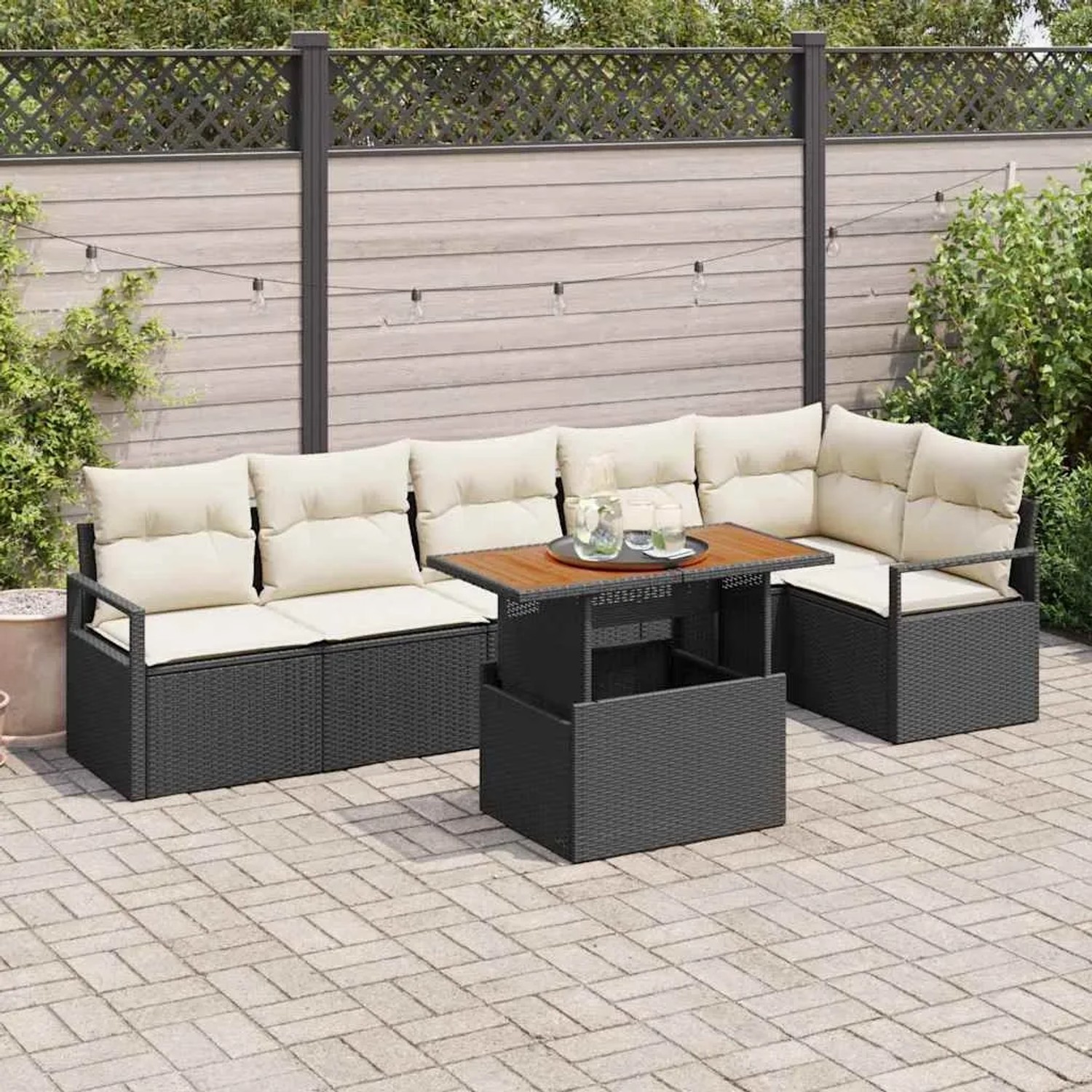 7-teiliges Gartensofa-Set von vidaXL aus schwarzem Poly Rattan mit Kissen und Tisch.