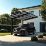 Schwarzes Ximax Alu Einzelcarport Linea Typ 80 mit Auto vor modernem Haus.