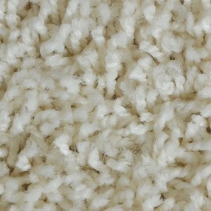 Detailaufnahme: Cremefarbener KARAT Shaggy Teppich Barcelona mit weichem Flor.