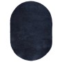 Ovaler marineblauer Shaggy Hochflorteppich NAVARRA aus Polyester. Weiche Textur für Wohnräume.
