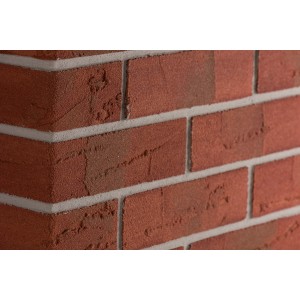 Nahaufnahme: Elabrick Eckverblender Cordoba in Rot-Braun, Mauerwerk-Optik.