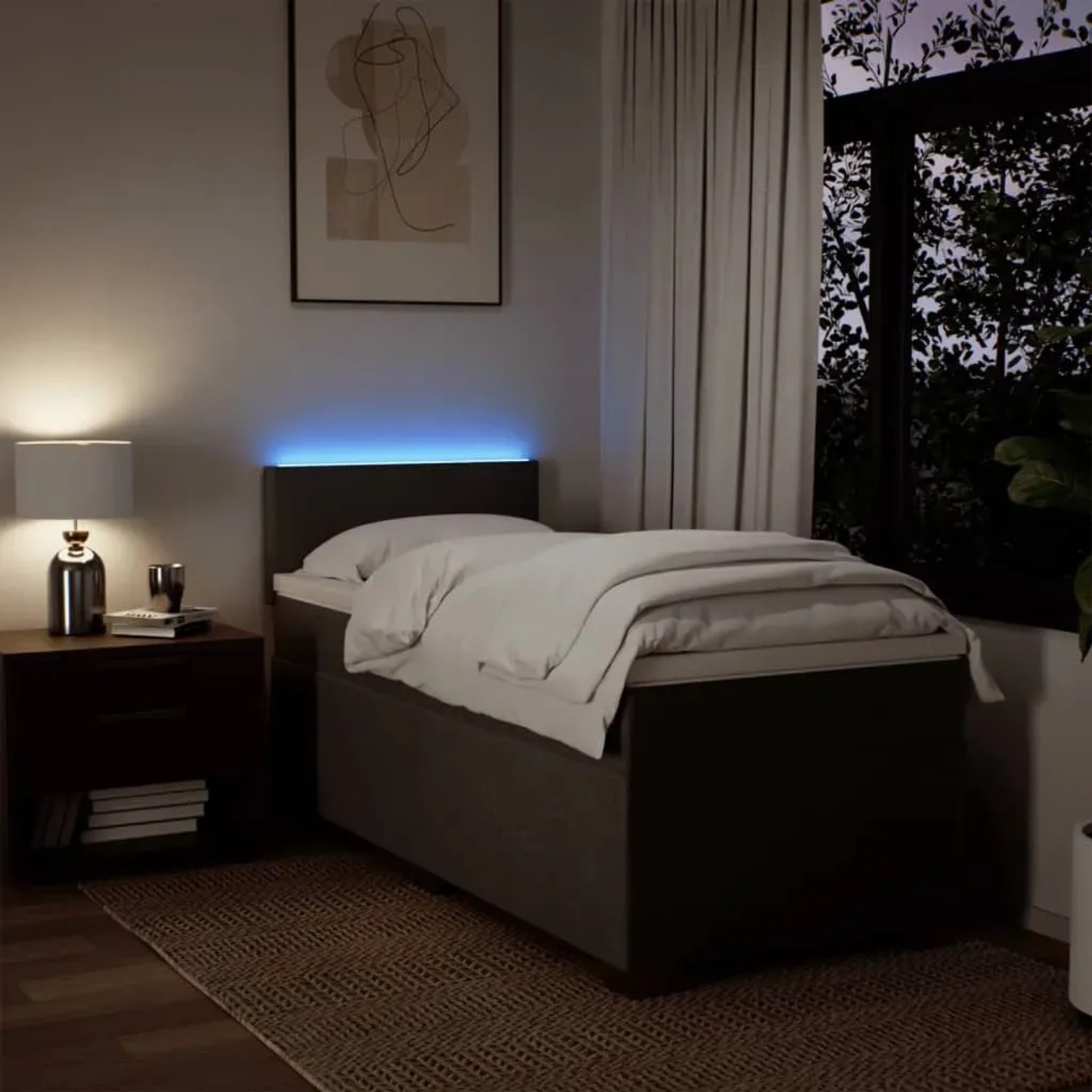Hellgraues vidaXL Boxspringbett 90x190 cm mit LED-Beleuchtung im Schlafzimmer.