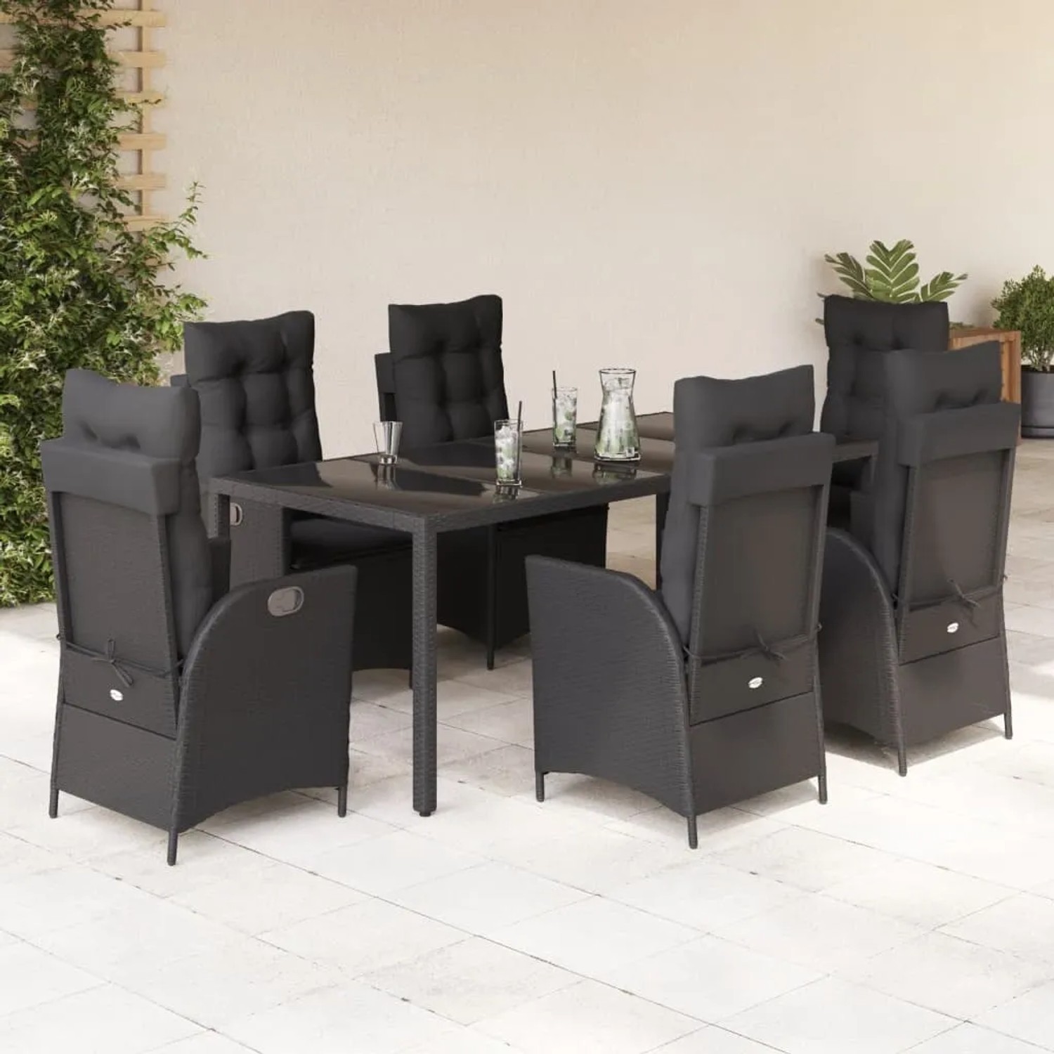 Schwarze 7-tlg. Garten Essgruppe aus Polyrattan mit Kissen und verstellbaren Stühlen.