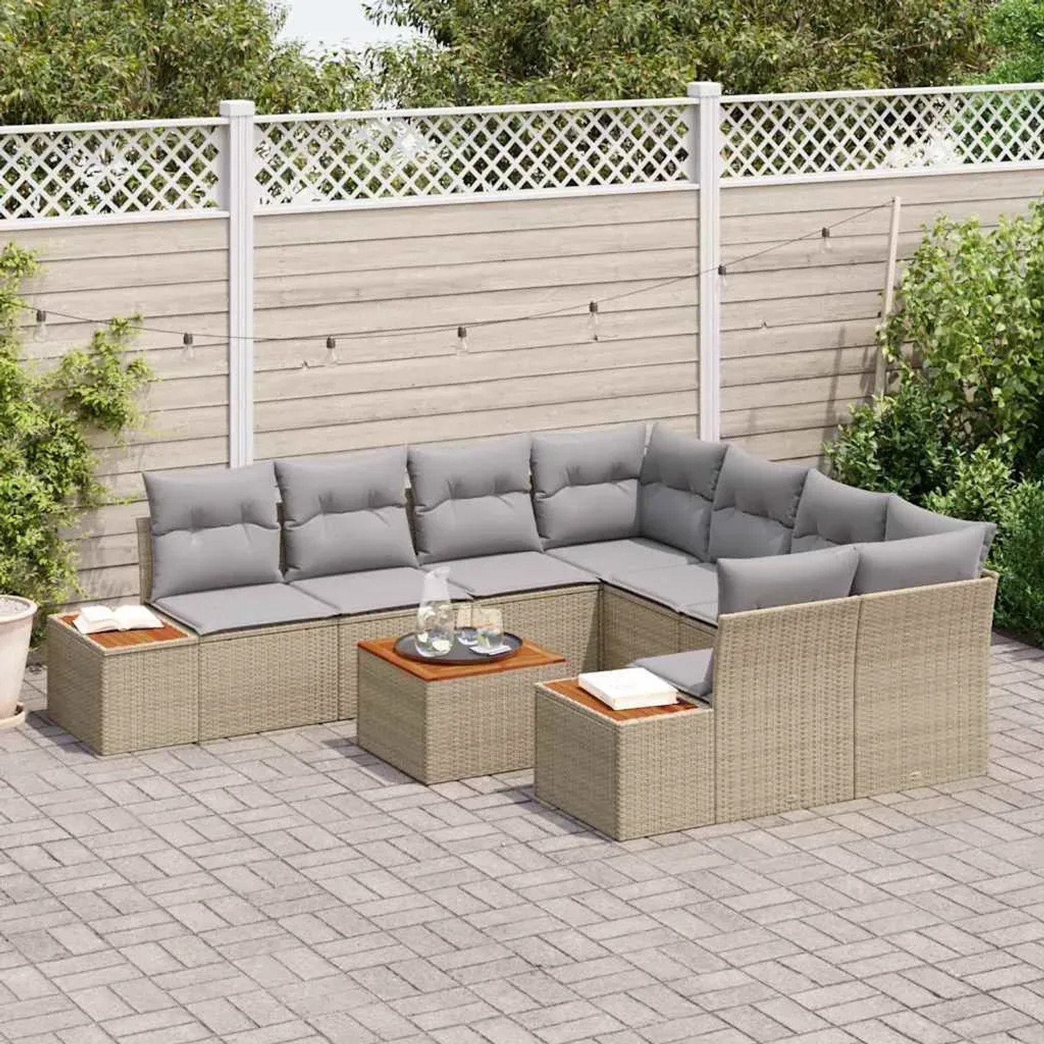 Beiges 9-teiliges vidaXL Garten-Sofa-Set aus Poly Rattan mit Kissen und Stauraum.