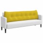 Gelbes Samt-Rückenkissen mit Knopfheftung auf weißem Sofa. Ideal für Komfort und Stil im Wohnzimmer.