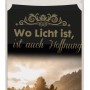 Ambrosius Motivgrablicht mit Landschaftsmotiv und dem Schriftzug: Wo Licht ist, ist auch Hoffnung.