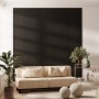 Schwarzes Akustikpaneel 240 cm als Wandverkleidung mit Akustikfilz zur Schallreduzierung.