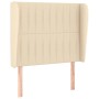 Cremefarbenes Boxspringbett mit Matratze, Stoffbezug, 80x200 cm. Bett mit gestepptem Kopfteil.