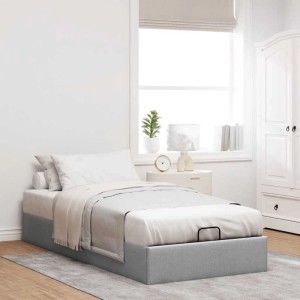Hellgraues Ottoman-Bett aus Stoff 100x200 cm mit integriertem Stauraum und Hebemechanismus im Schlafzimmer.