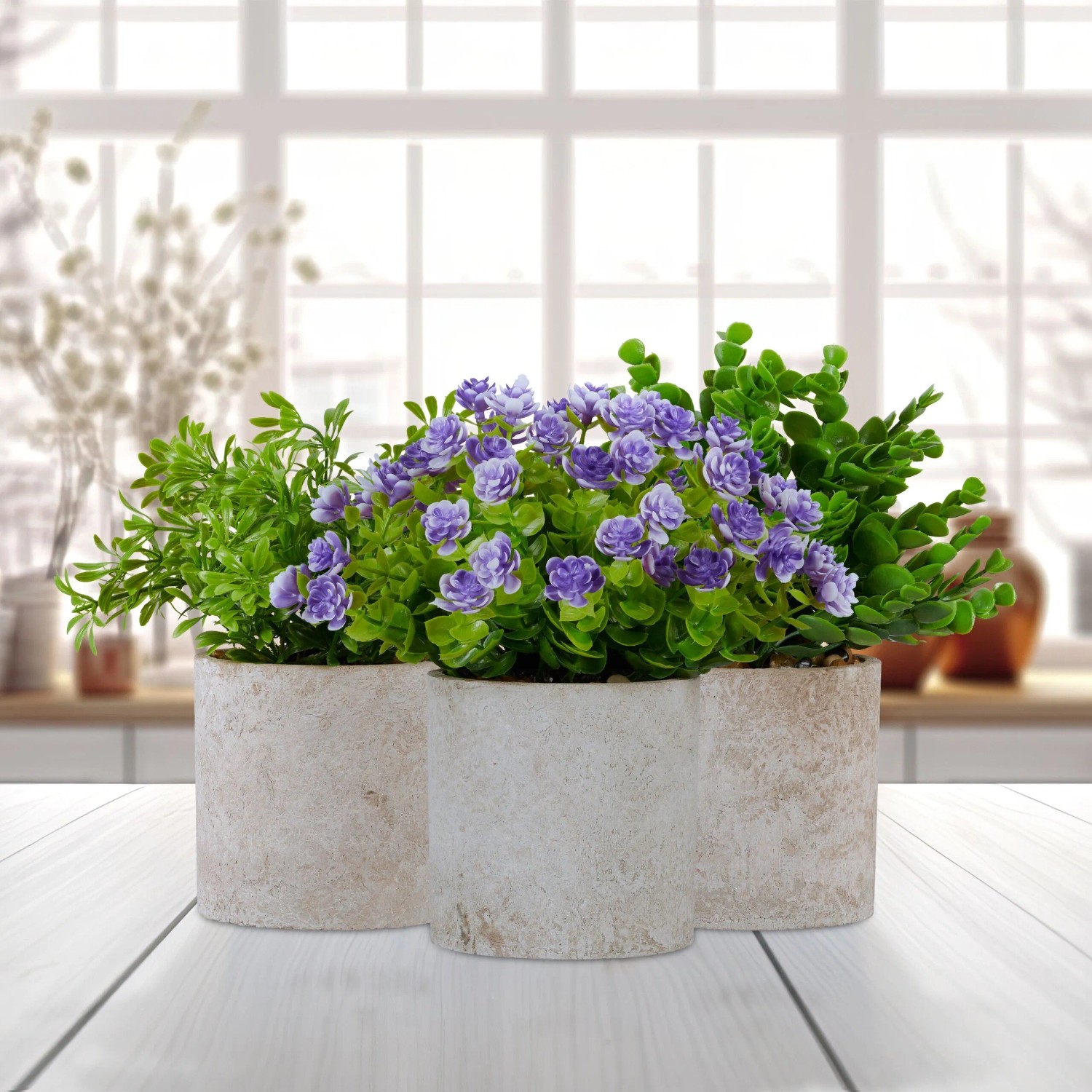 3er Set Kunstpflanzen in Töpfen mit grünen Blättern und lila Blüten, ca. 20-23cm hoch.