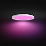 Weiße Philips Hue Surimu LED-Panelleuchte, Ø 39,5 cm, mit pinkfarbenem Licht.