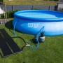 Steinbach Speed Solar Sun Kollektoren (600x70 cm) mit Pool und Filteranlage im Garten.