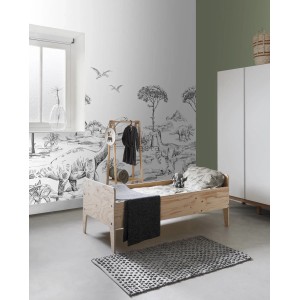Kinderzimmer mit ESTAhome Fototapete Dinosaurier in Schwarz-Weiß an der Wand.