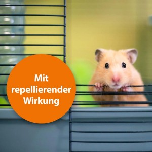 Hamster im Käfig, geschützt durch Ardap Milben- & Zeckenspray für Nager und Vögel.