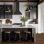 Fireplace Barcelona Kaminofen mit Speckstein Verkleidung in Schwarz, 8 kW Leistung im modernen Küchenambiente.
