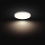 Weiße, runde Philips Hue LED-Deckenleuchte Tento White S mit warmweißem Licht.