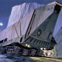 Komar Vlies Fototapete Star Wars Sandcrawler (500x250cm) mit Wüstenlandschaft.