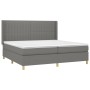 Dunkelgraues Boxspringbett 200x200 cm mit Matratze und Kopfteil aus Stoff.
