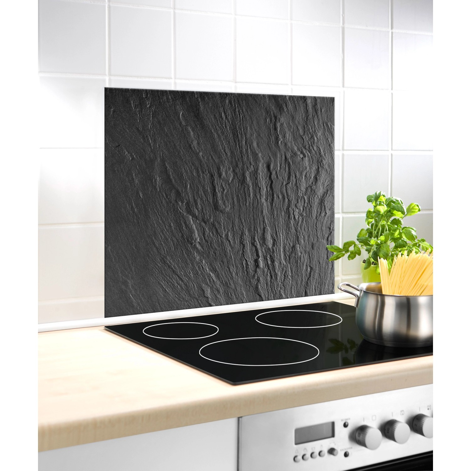 Wenko Glasrückwand Schiefer 60x50 cm als Spritzschutz hinter dem Herd.