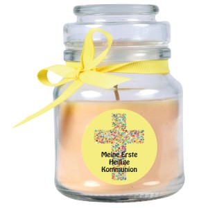 Gelbe Duftkerze im Glas mit Kommunion-Motiv und Schleife. Vanille Duft.