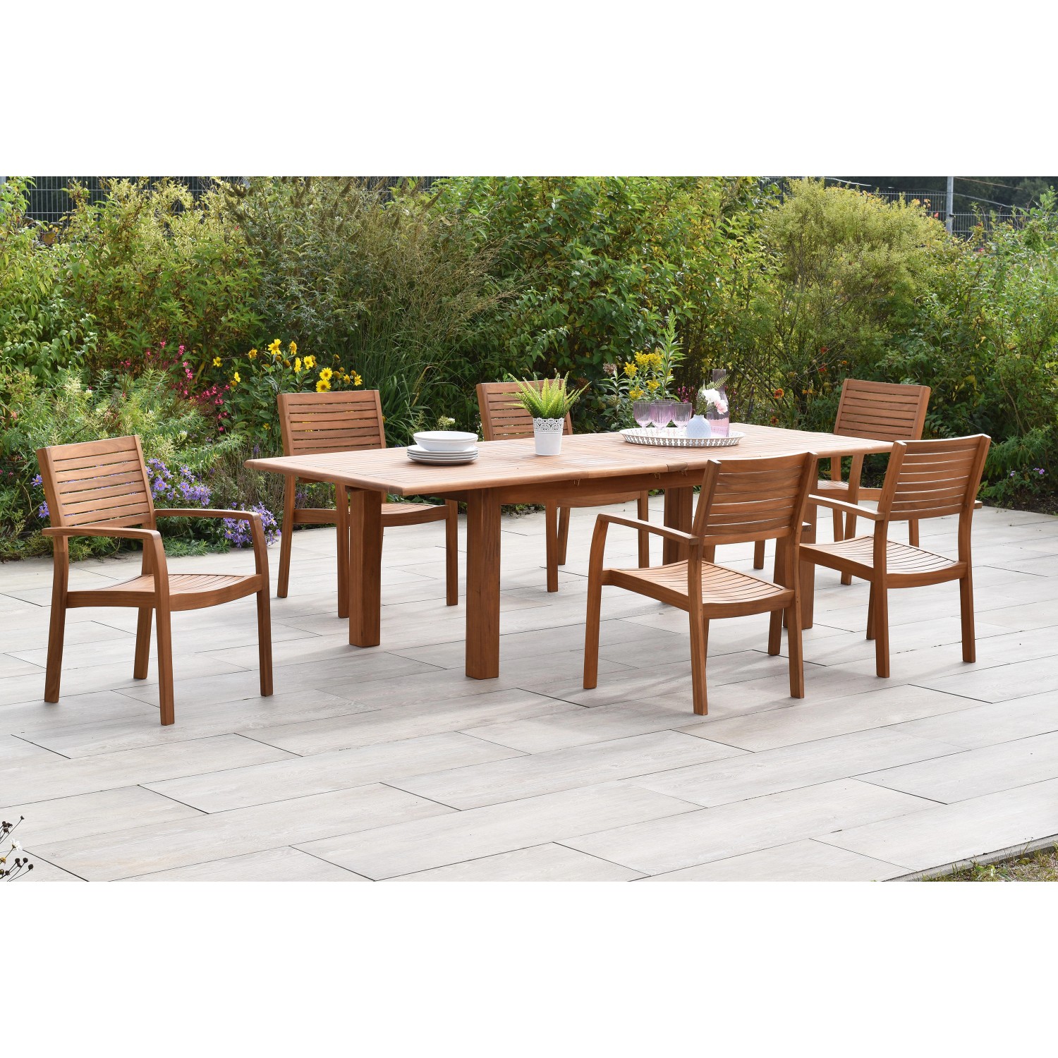 Merxx Batavia 7-tlg. Gartenmöbel-Set mit 6 Stapelsesseln und ausziehbarem Gartentisch aus Akazienholz.