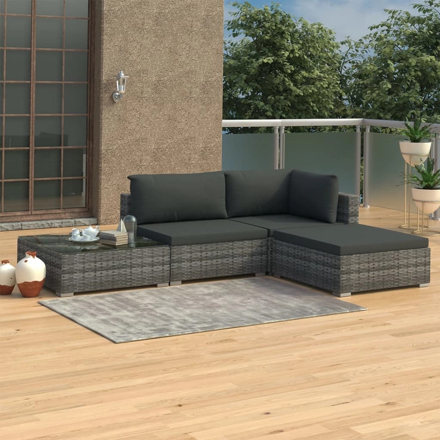 Graues 4-tlg. vidaXL Garten Lounge Set aus Polyrattan mit Auflagen und Tisch.