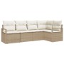 5-teiliges Garten Sofa Set aus beigem Poly Rattan mit Kissen.