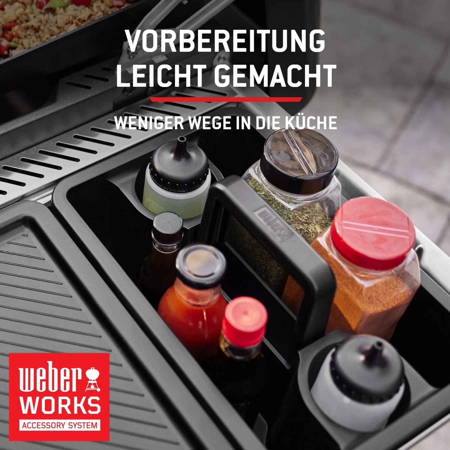 Weber Genesis Stealth E-330WR Gasgrill mit Weber Works Zubehör für Gewürze und Saucen.