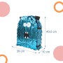 Blaue, glänzende Monster Pinata aus Pappe, 49,5 cm hoch, mit weißen Augen und schwarzem Mund. Befüllbar für Partys.
