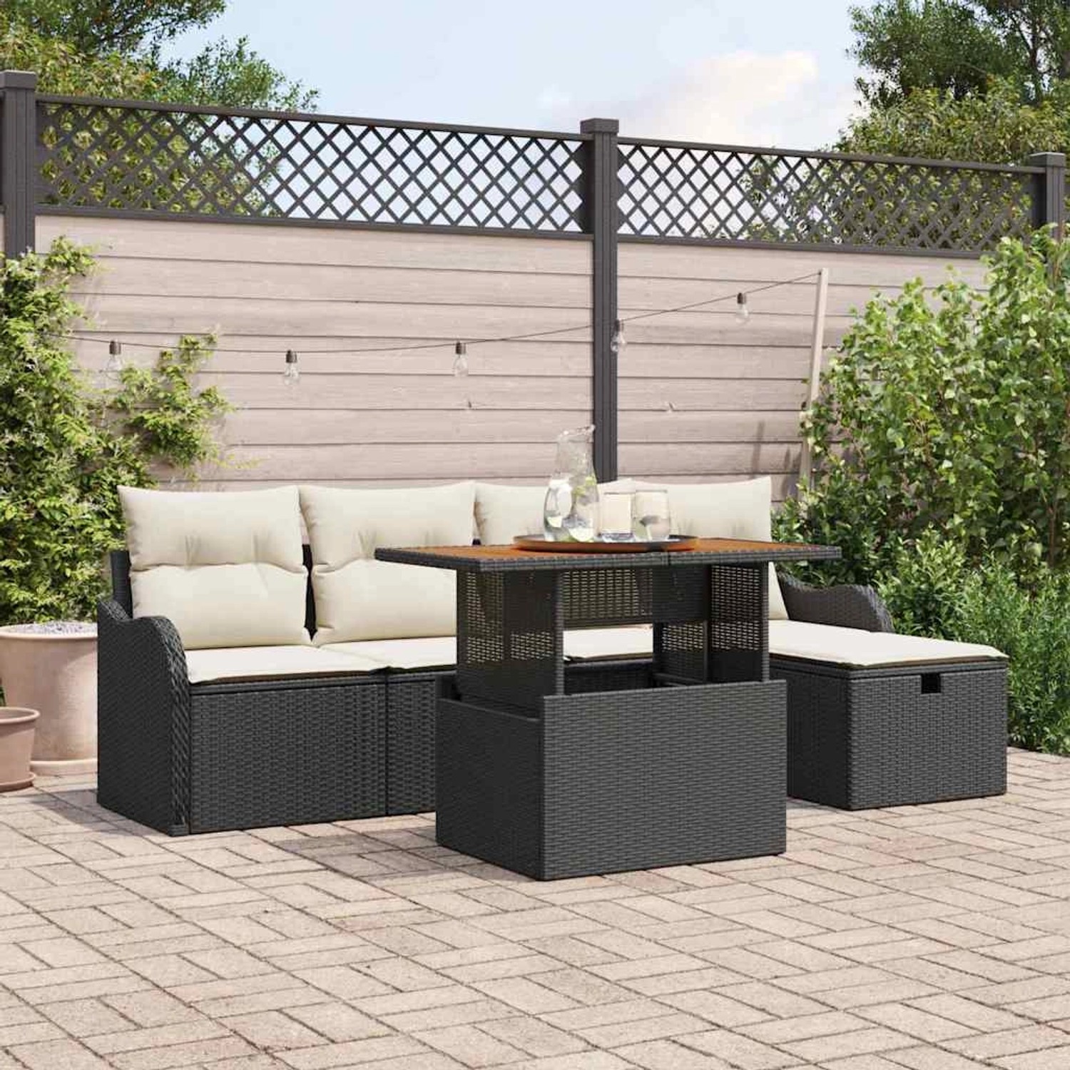 Schwarzes 6-tlg. vidaXL Garten-Sofa-Set aus Poly Rattan mit Tisch und Kissen.