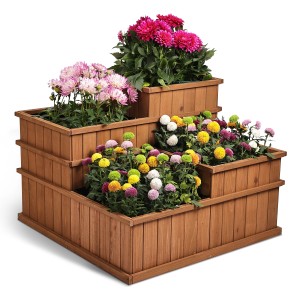 Needs&wants Hochbeet Quadry1 mit 4 Pflanzkästen aus braunem Holz, bepflanzt mit bunten Blumen.