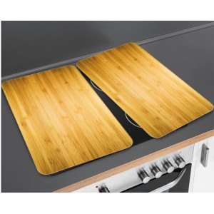 2er Set Wenko Herdabdeckplatten in Holzoptik auf einem Herd.