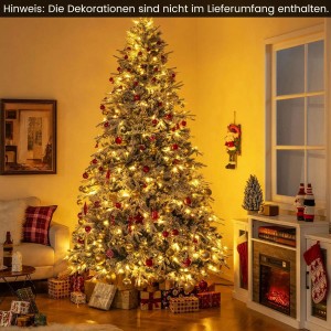 Geschmückter, künstlicher Costway Weihnachtsbaum (270cm) mit Schnee und warmweißen Lichtern im Wohnzimmer.